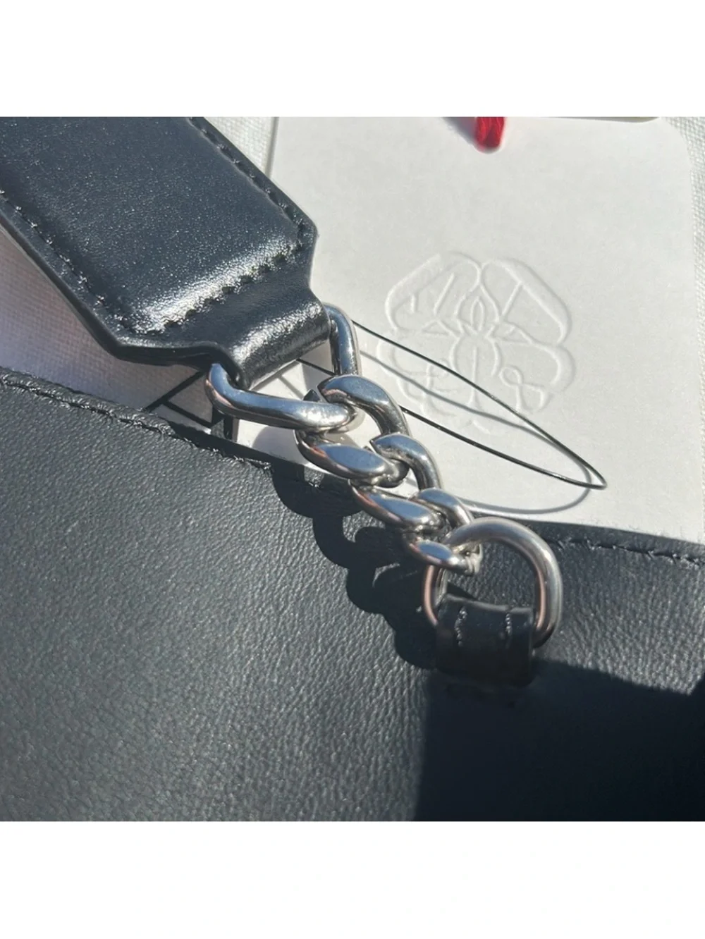 New pre-authenticated Alexander McQueen skull denim bag with dust bag